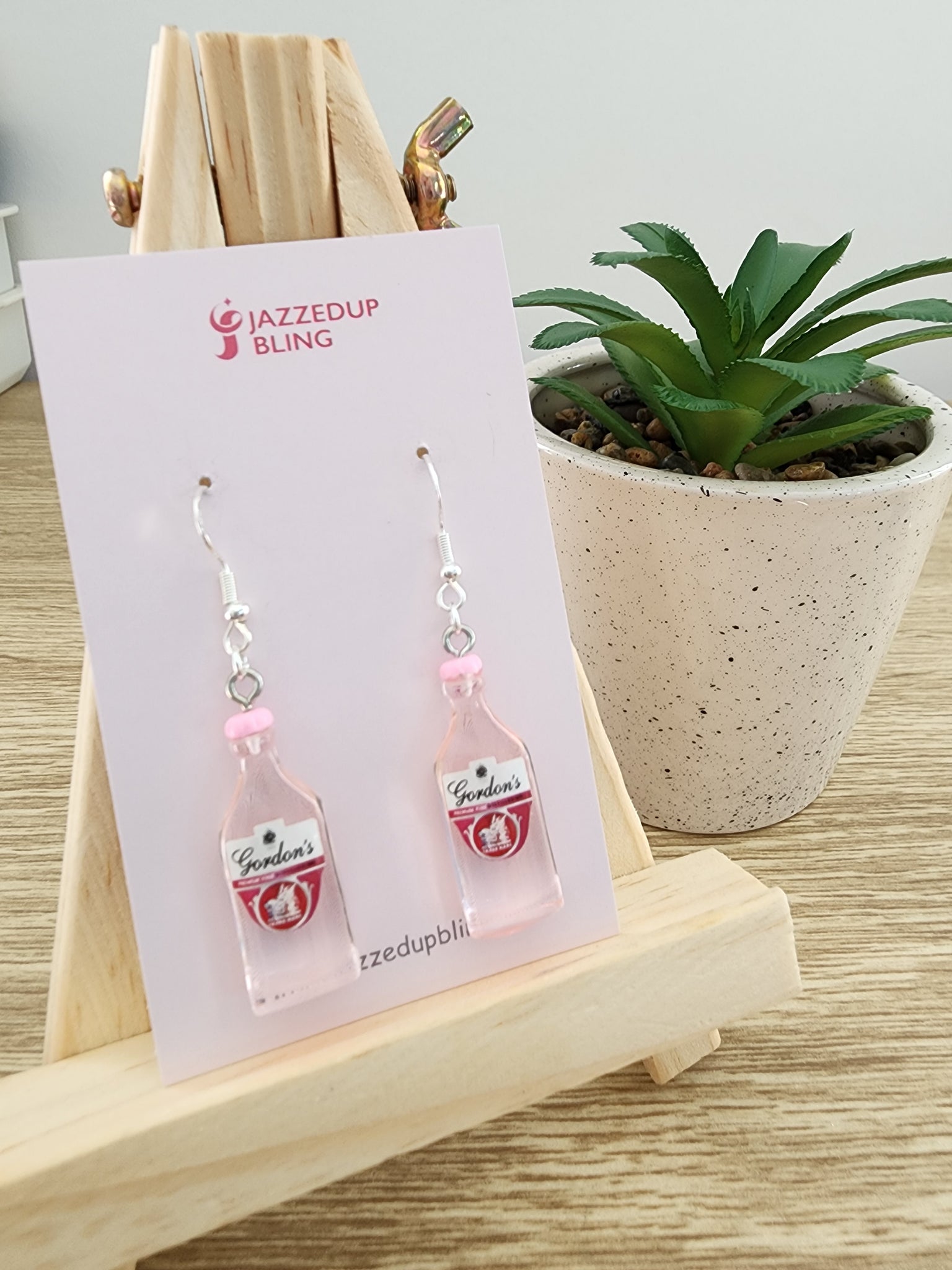Pink gin earrings sales