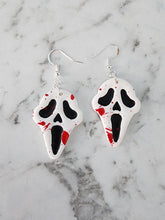 Load image into Gallery viewer, Handmade Ghost Face Halloween earrings with blood splatter – horror polymer clay jewelry NZ.
