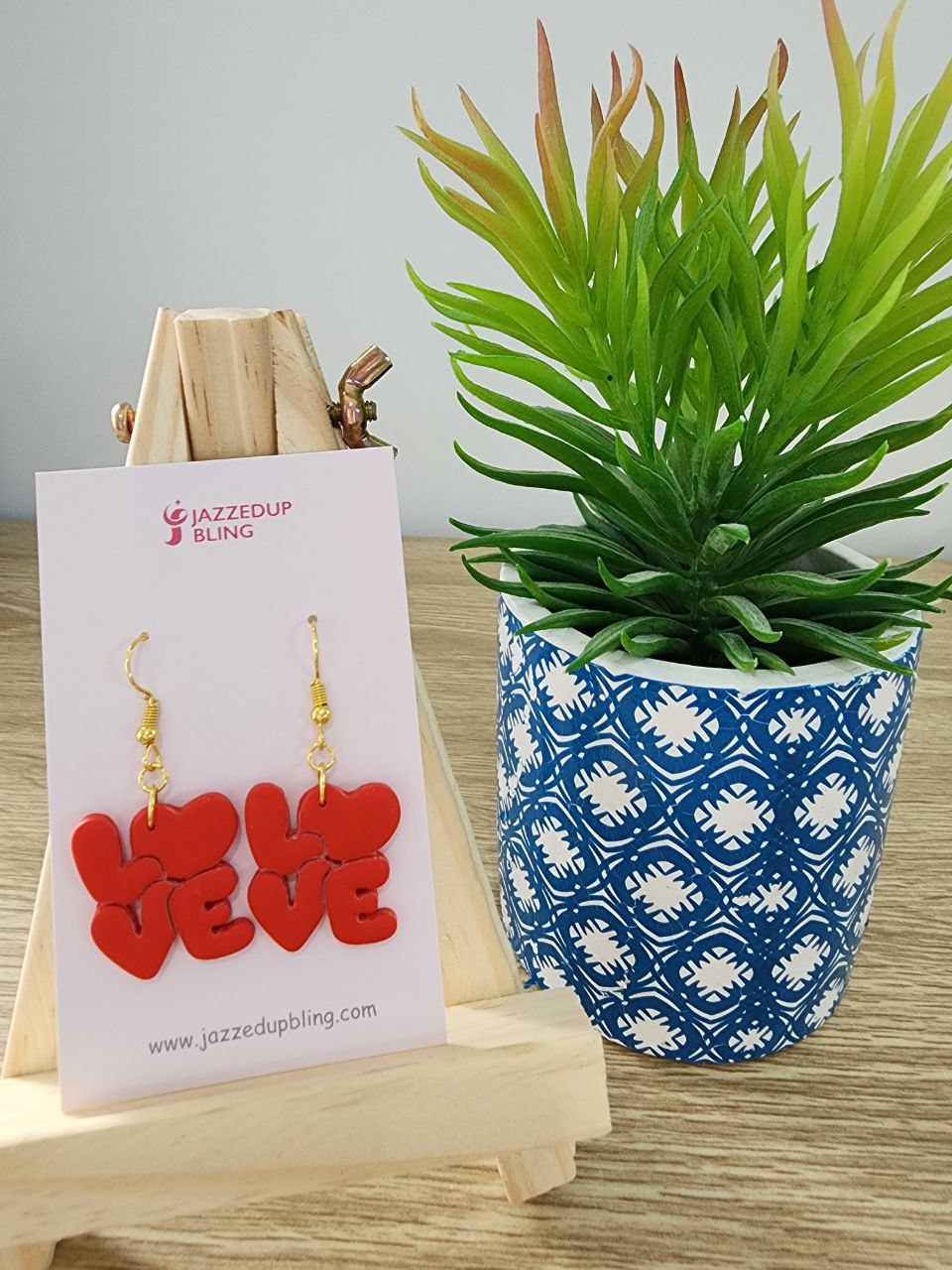 L. O. V. E Dangles