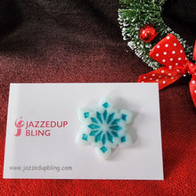 Load image into Gallery viewer, Handmade blue snowflake brooch – polymer clay Christmas jewelry by Jazzed Up Bling
