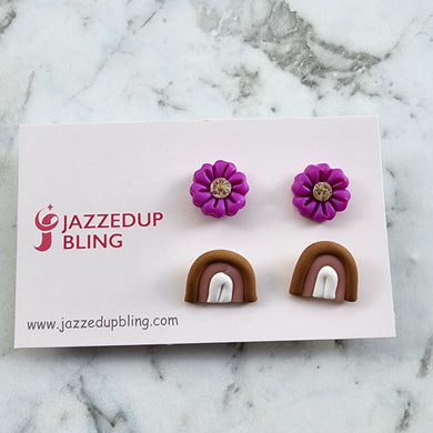 Handmade polymer clay stud pack with purple flowers and neutral rainbows – Jazzed Up Bling.