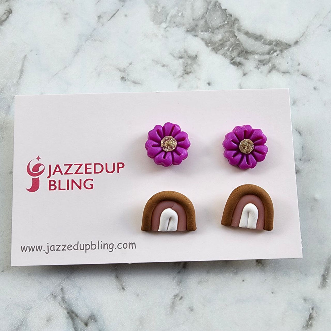 Handmade polymer clay stud pack with purple flowers and neutral rainbows – Jazzed Up Bling.