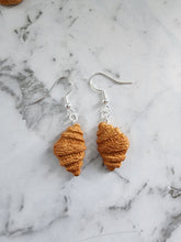 Load image into Gallery viewer, Realistic handmade croissant earrings – detailed textured pastry design by Jazzed Up Bling.
