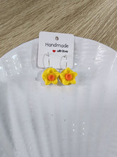 Load image into Gallery viewer, Yellow daffodil leverback earrings with orange centers on silver hoops – vibrant floral design
