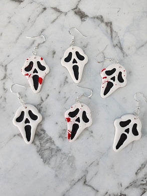 Handmade Ghost Face Halloween earrings in three variants – blood splatter, no blood, and mismatched – polymer clay horror jewelry NZ.