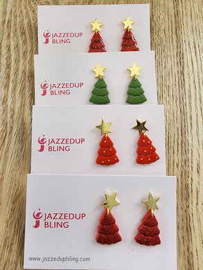 Handcrafted Christmas tree stud earrings in red and green with gold star toppers by Jazzed Up Bling displayed on earring cards