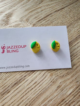Load image into Gallery viewer, Handmade lemon stud earrings by Jazzed Up Bling – yellow polymer clay citrus studs with green leaf.
