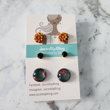 Load image into Gallery viewer, Mustard flower polymer clay studs paired with black and pink vinyl-wrapped round earrings from Jazzed Up Bling, handmade in New Zealand.
