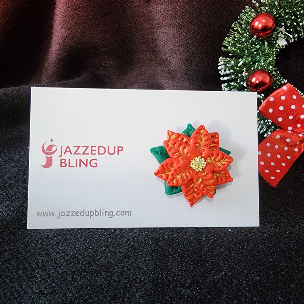 Handmade poinsettia brooch in festive Christmas design