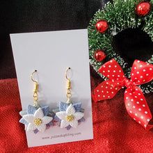 Load image into Gallery viewer, Blue and silver poinsettia Christmas earrings with gold-colored copper hooks
