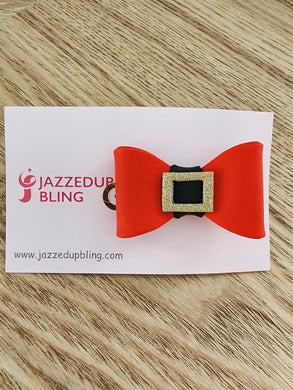 Handmade Santa belt bow hair clip with red bow and glittery gold buckle – festive Christmas accessory by Jazzed Up Bling NZ
