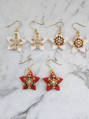 Handmade Snowflake Lantern Christmas earrings in red and white with rhinestone snowflakes and gem accents, festive holiday jewelry with gold hooks.