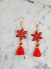 Load image into Gallery viewer, Handmade red star lantern parol earrings with red tassels and gold hooks, festive Christmas jewelry.
