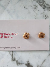 Load image into Gallery viewer, Neutral peachy-beige polymer clay knot earrings, lightweight and minimal.
