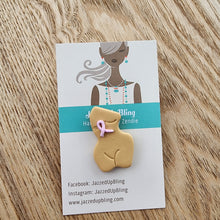 Load image into Gallery viewer, Breast cancer awareness brooch – handmade polymer clay torso with ribbon left
