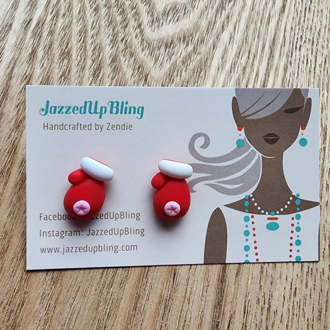 Christmas Mittens resin stud earrings with red mitten design, white trim, and button detail – festive holiday jewelry NZ.