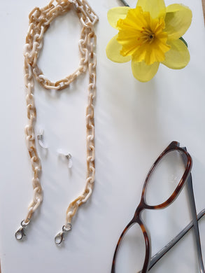 Clearance acrylic glasses chain in beige tones shown with glasses – lightweight eyewear strap by Jazzed Up Bling NZ.