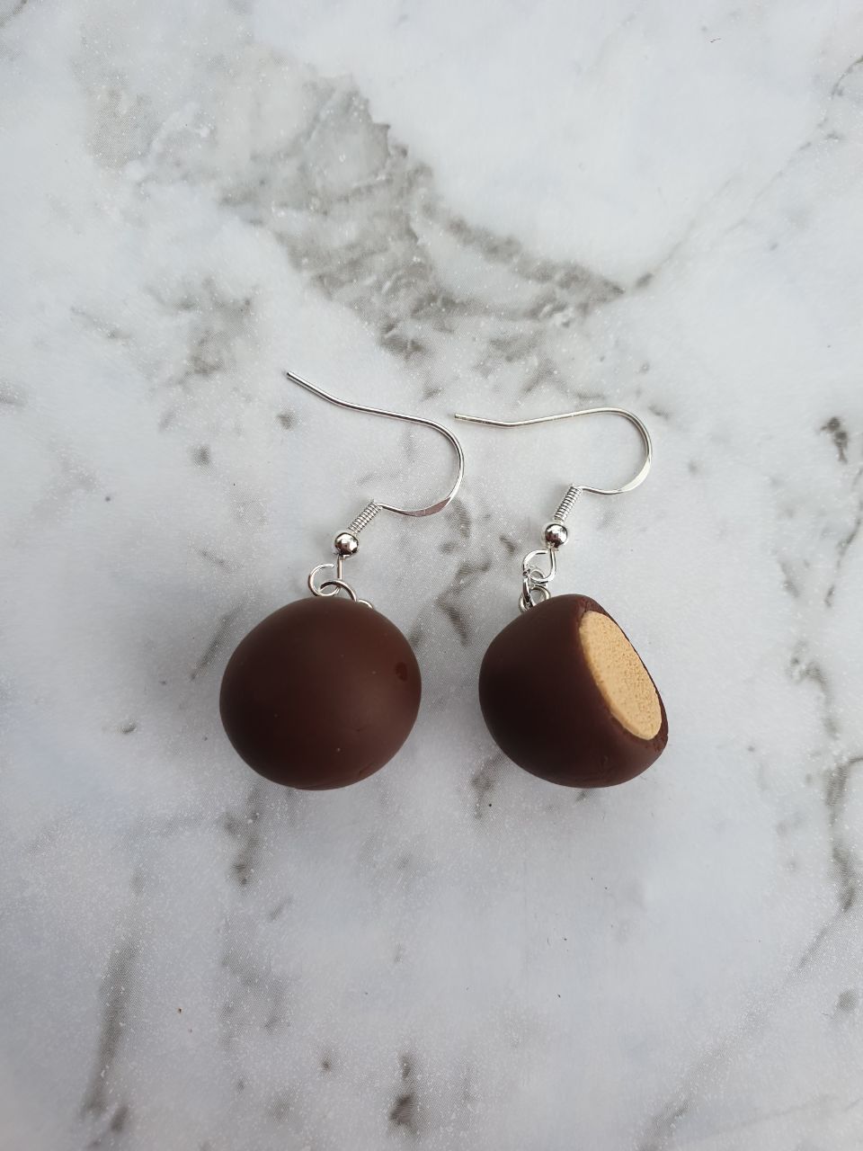 Handmade Maltesers mismatched earrings with bite detail – Jazzed Up Bling.