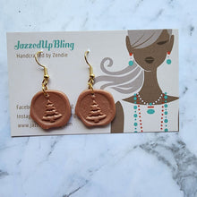 Load image into Gallery viewer, Handmade polymer clay wax seal earrings with Christmas tree design by Jazzed Up Bling.
